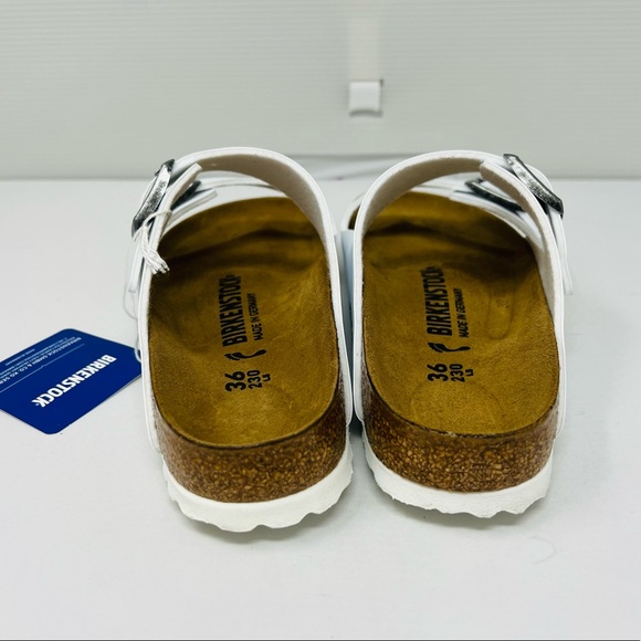 BIRKENSTOCK**White Slides**US 5**$130 - Picture 5 of 6